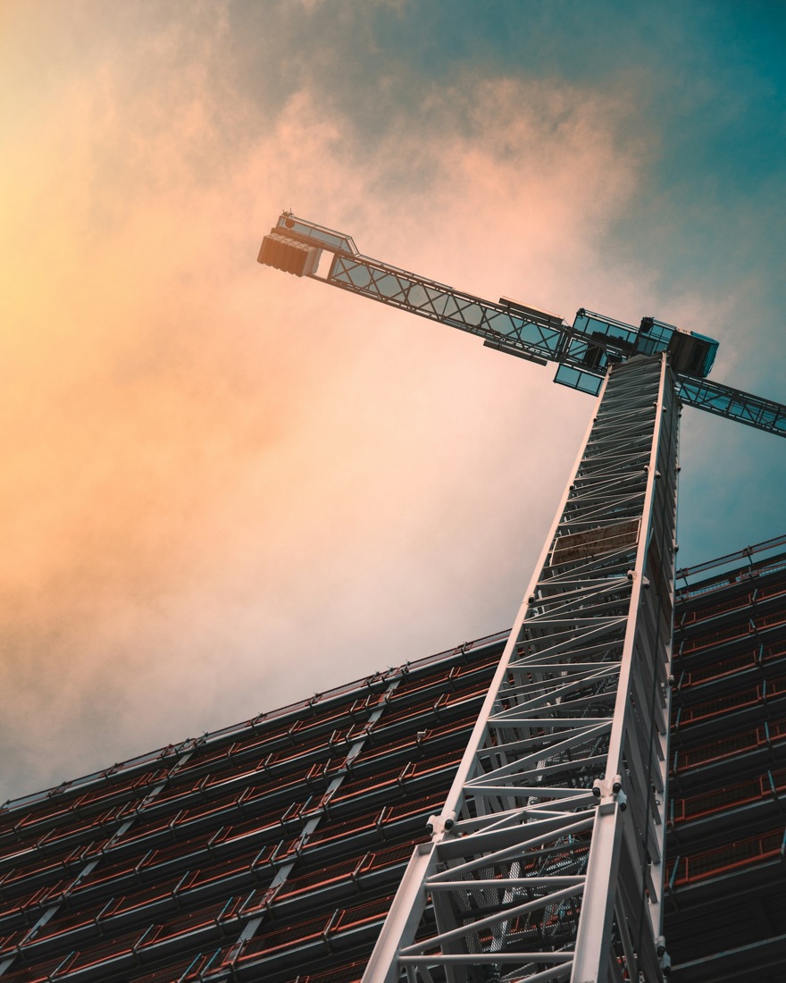Steel frame rising on a commercial construction site